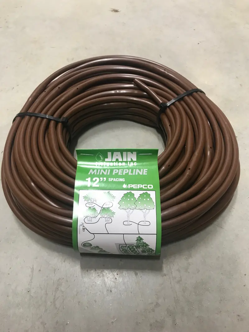 Jain - 1/4'' Brown Mini Pepline, 12'' Spacing, 100' Coil - Pm0412100b 1